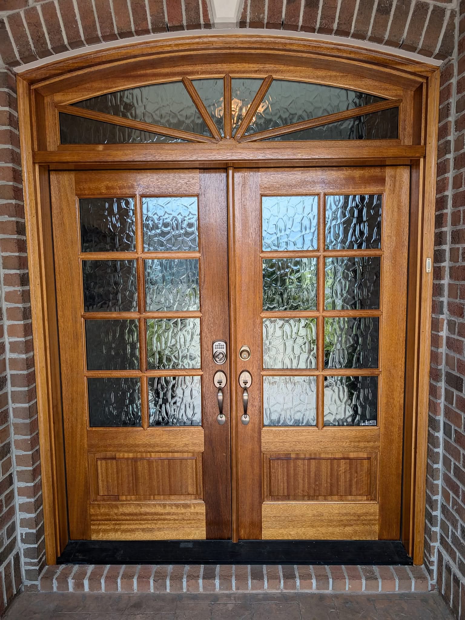 Refinished arched entry doors
