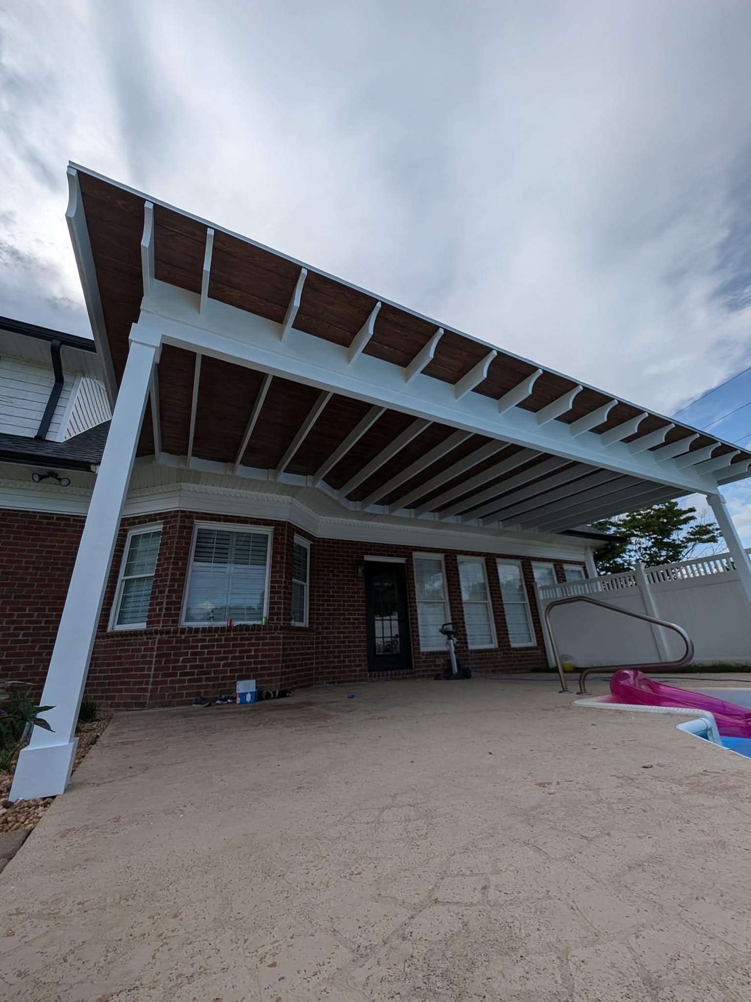 Wide view of a finished wood patio cover
