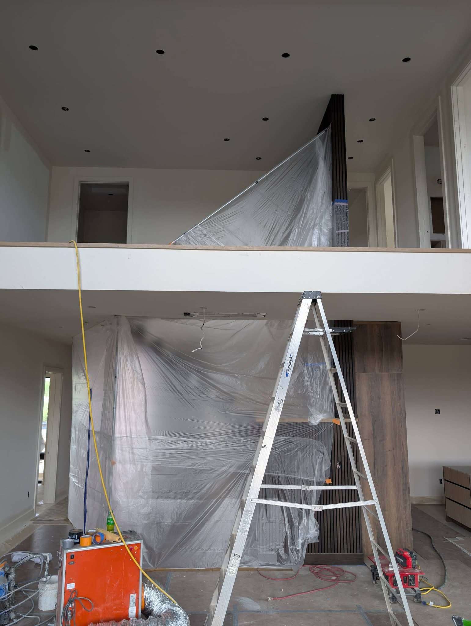 Interior walls masked and ready to finish