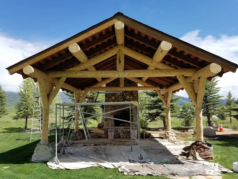 Log gazebo staining — before